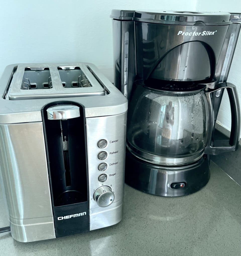 Coffee, tea, oil, salt, pepper, and sugar are provided.