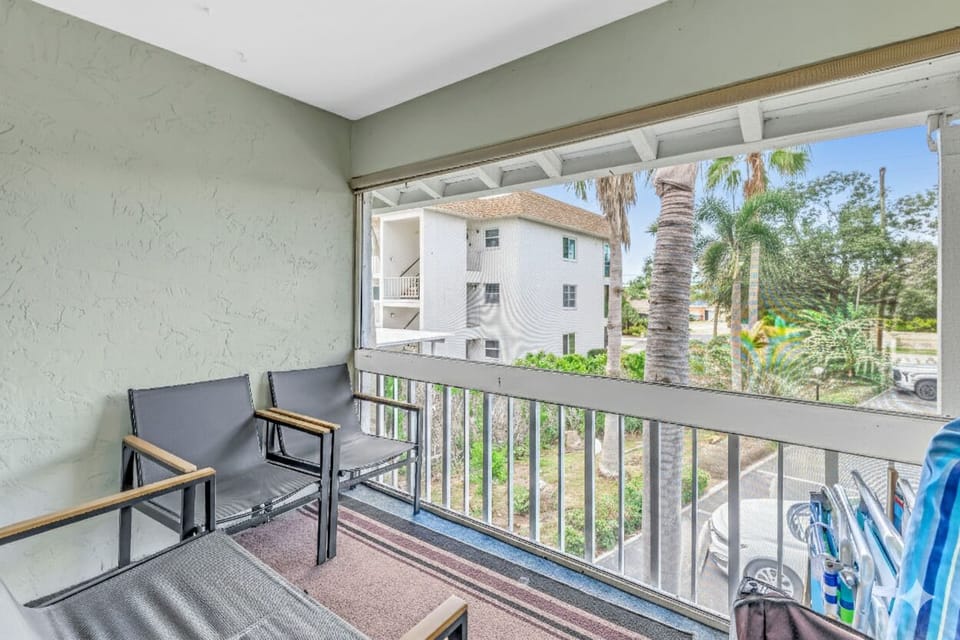 Screened in balcony just outside living area.