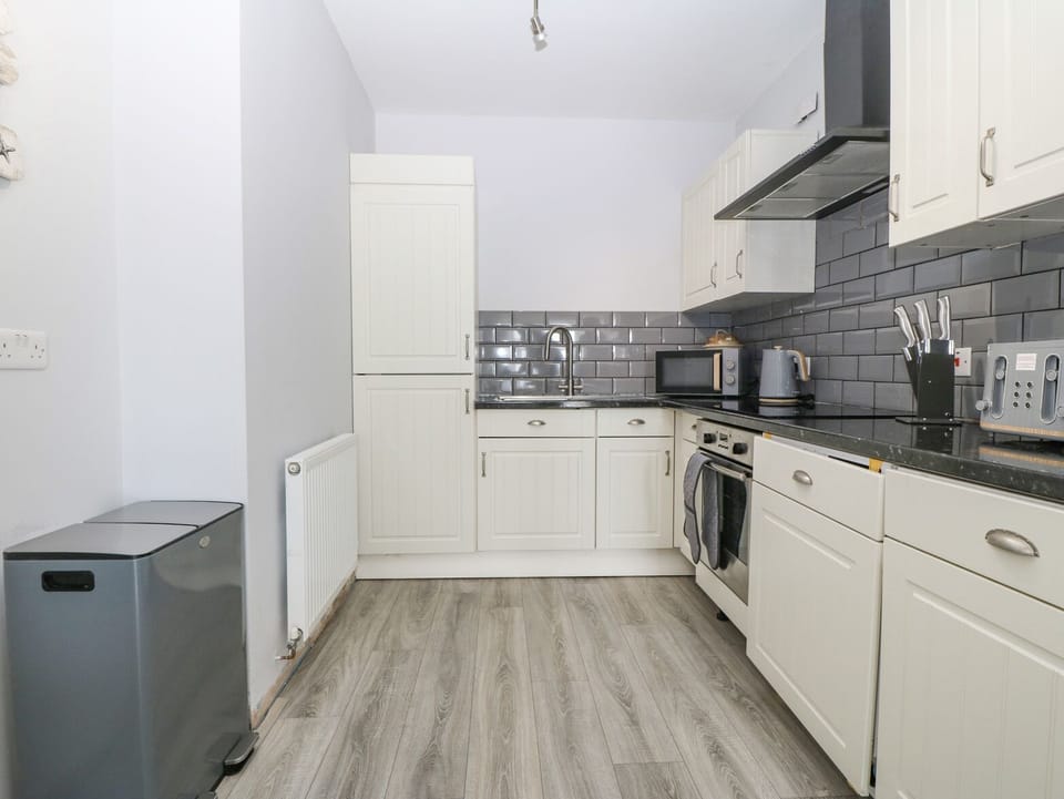 Fridge, dishwasher, electric kettle, toaster