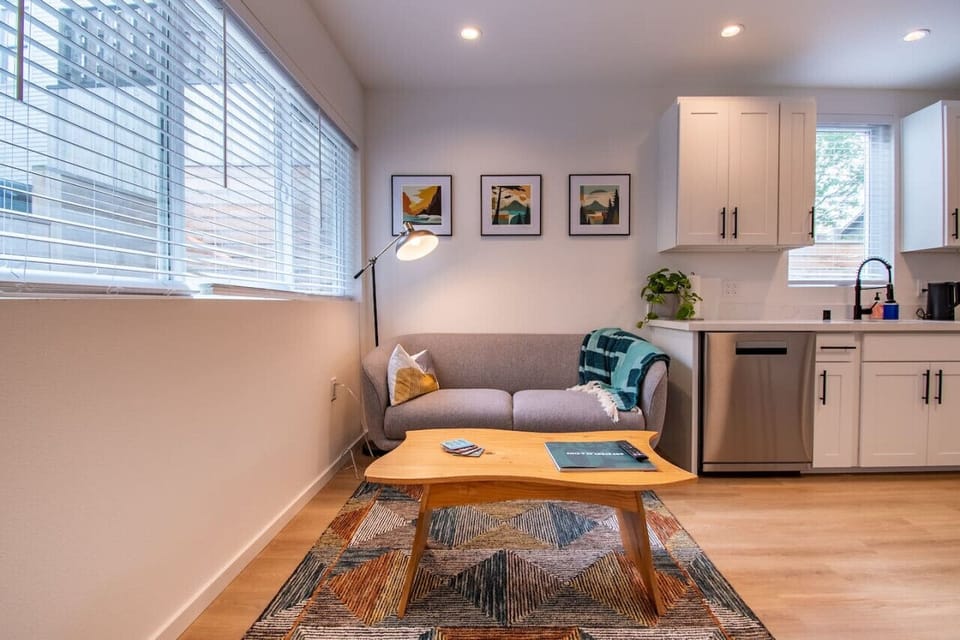 Experience comfort in our simple living space! The cozy sofa and center table make it ideal for relaxing.