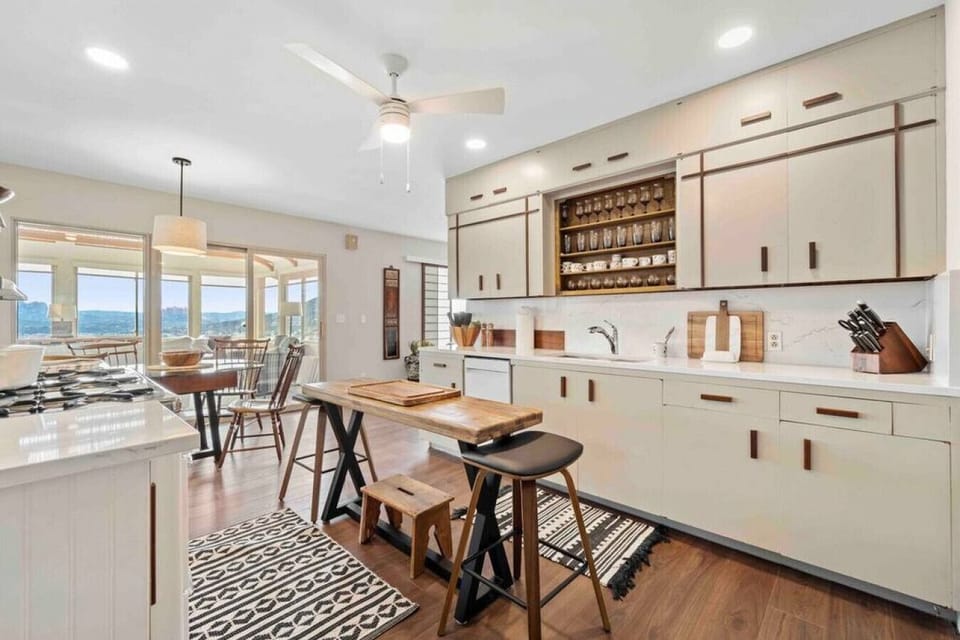 The kitchen area boasts all modern amenities to make your stay enjoyable