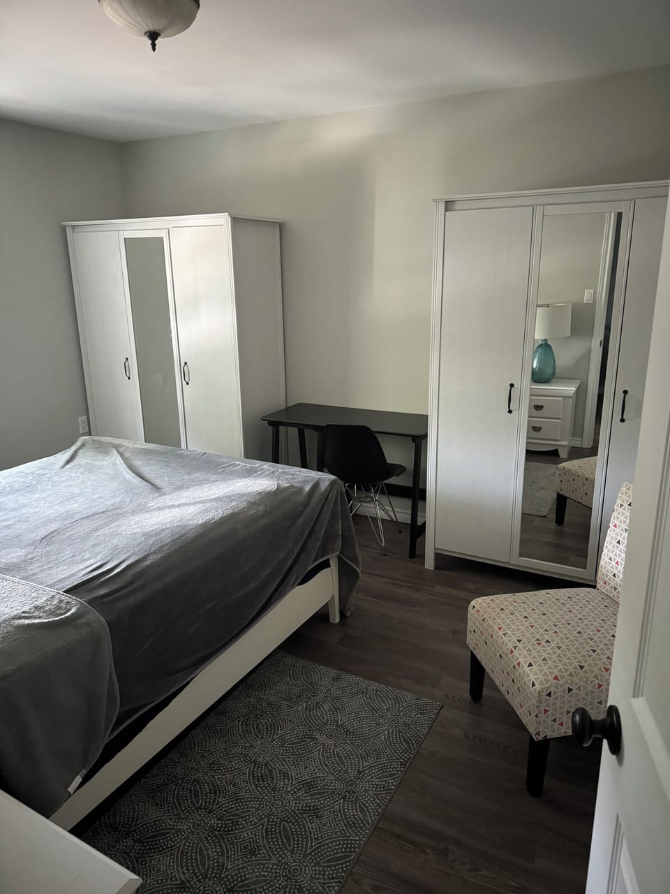Ample storage with iron and ironing board