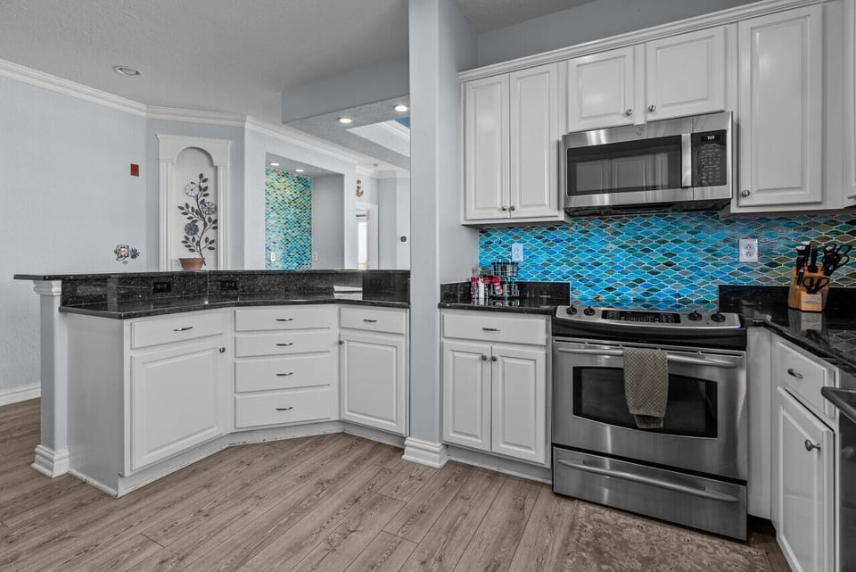 This clean and functional kitchen provides everything you need for simple cooking or quick meal preparation.