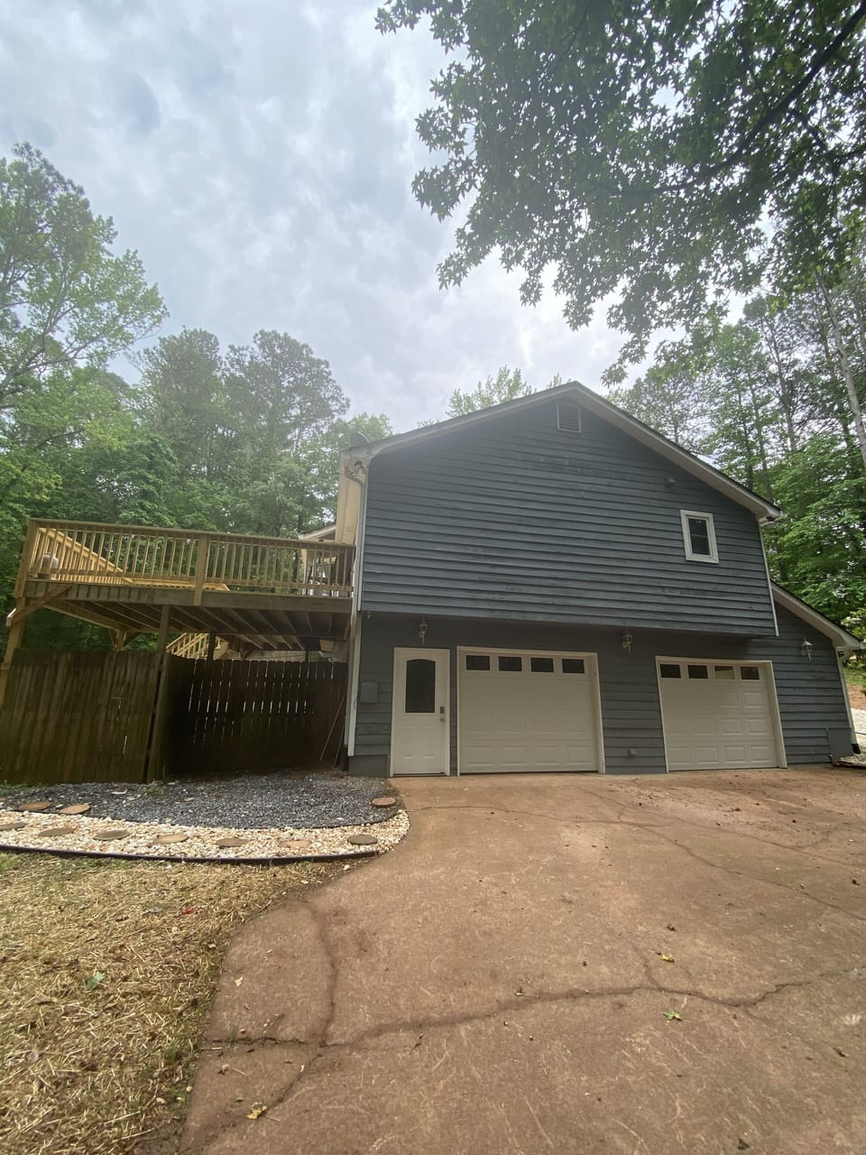 Right side of home and garage.