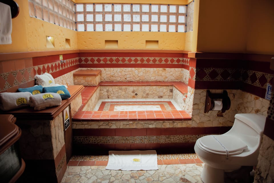 Premium Quadruple Room | Bathroom | Shower, towels