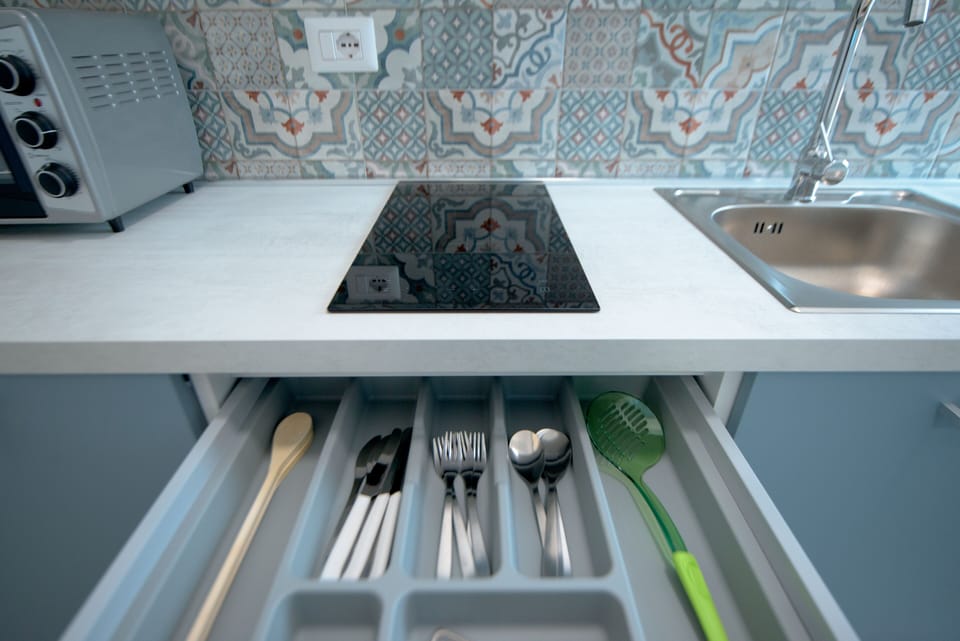 Condo, Non Smoking, Sea View | Private kitchen | Full-size fridge, oven, stovetop, cookware/dishes/utensils