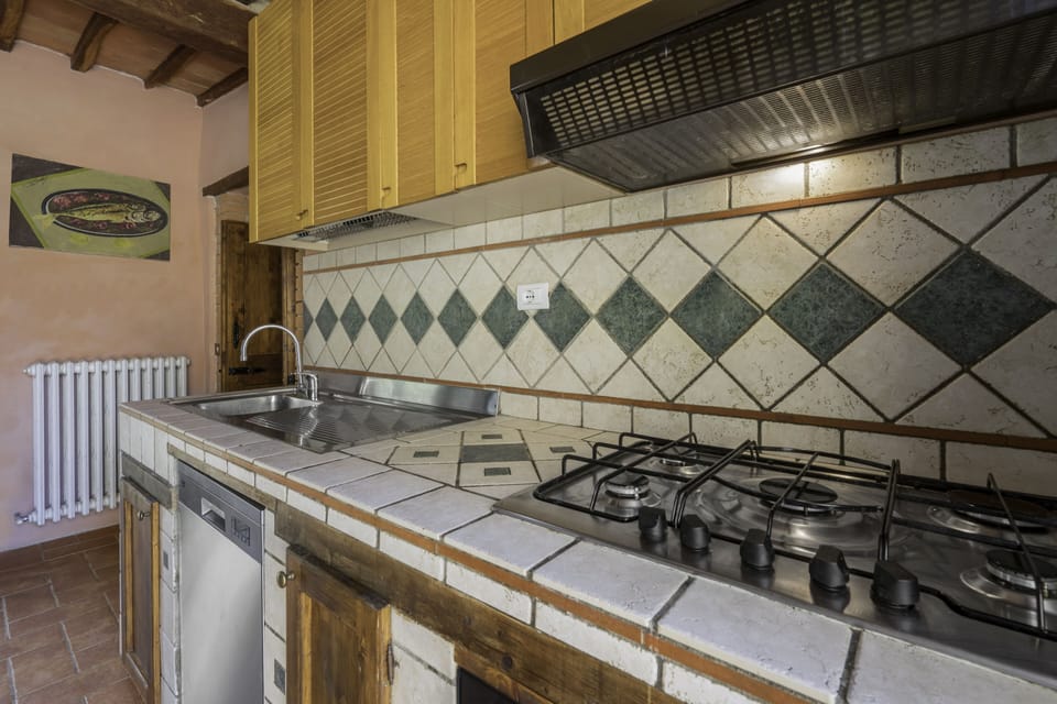 Villa | Private kitchen | Full-size fridge, stovetop, dishwasher, coffee/tea maker