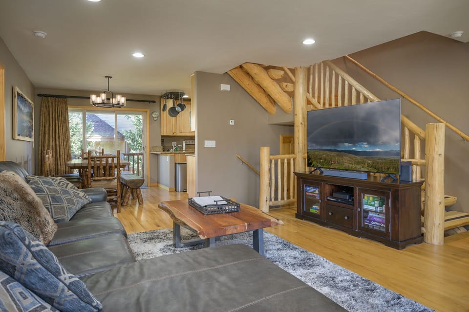 Main floor living area looking toward kitchen and back deck