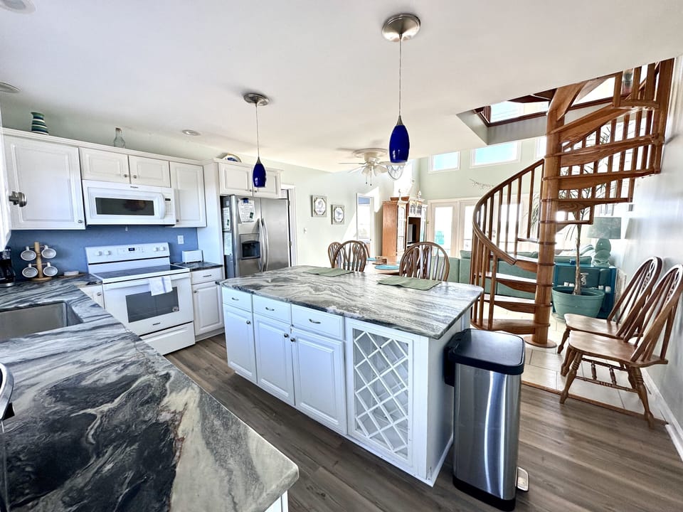 Kitchen with everything you may need.  The back door exits out onto the patio.