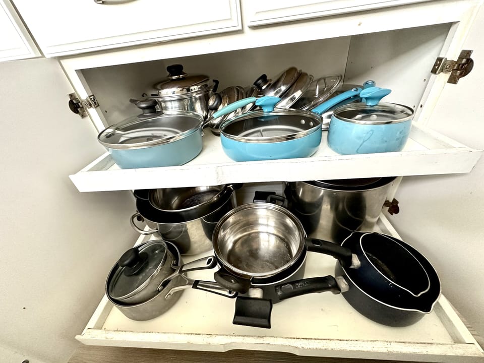 Variety of pots and pans for cooking.