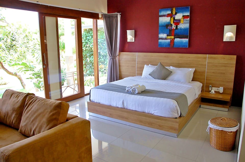 Bungalow, Sea View | Minibar, in-room safe, blackout drapes, free cribs/infant beds