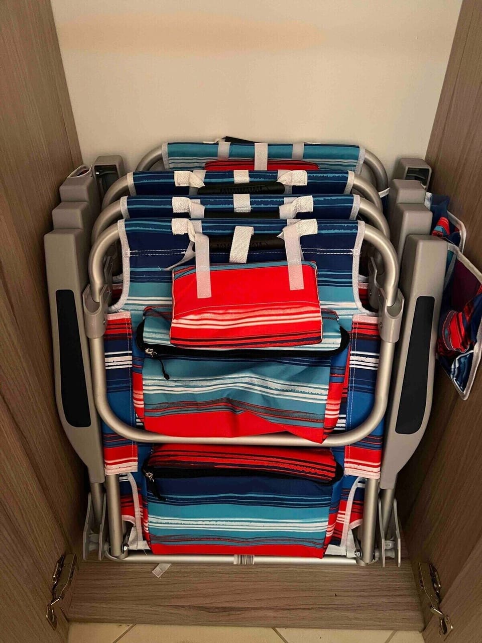 Four foldable beach chairs with carrying straps are available for use by the guests 