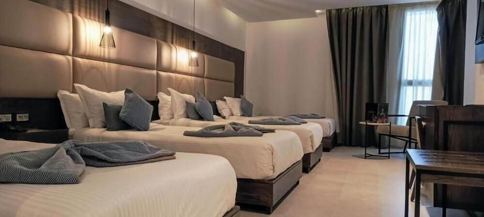 Superior Quadruple Room | Premium bedding, memory foam beds, minibar, in-room safe