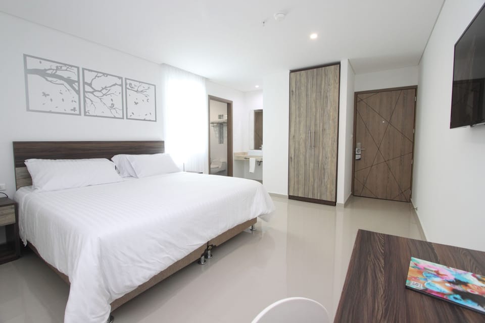 Premium bedding, down comforters, pillowtop beds, minibar