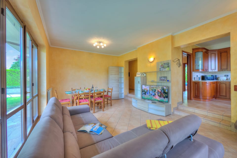 Standard House, 3 Bedrooms, Microwave (Il Sole Di Mirasole) | Living area | Flat-screen TV