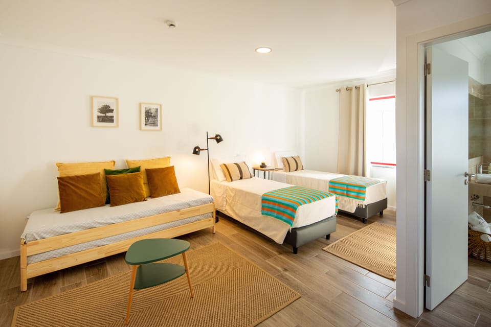 Family Double or Twin Room | Blackout drapes, travel crib, free WiFi, bed sheets