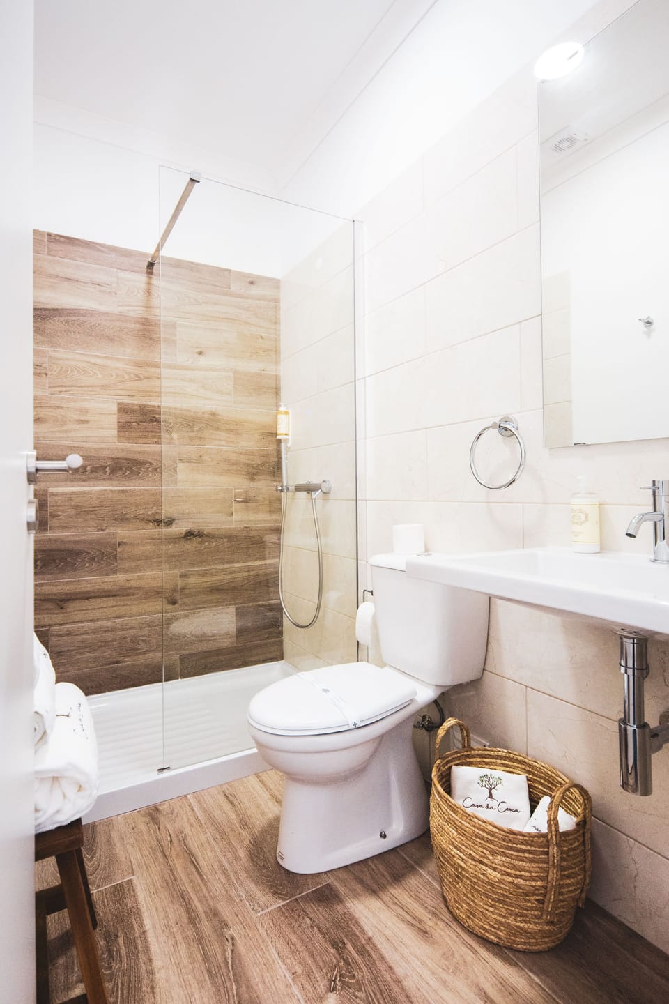 Shower, designer toiletries, hair dryer, towels