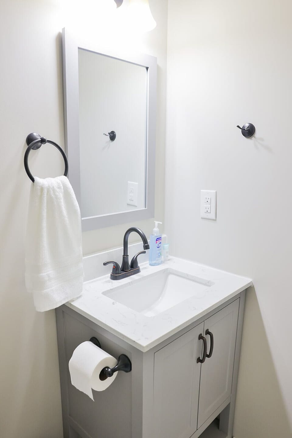 Hall bath with new vanity and toilet