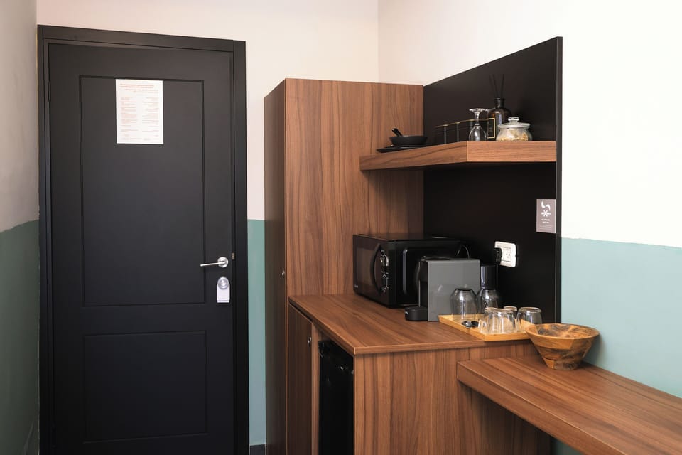 Mini-fridge, microwave, coffee/tea maker, electric kettle