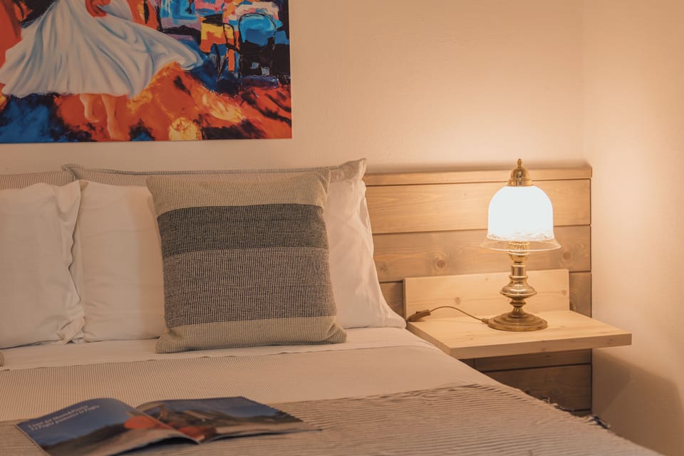 Family Room, Pool Access, Courtyard View | Minibar, in-room safe, individually decorated, individually furnished