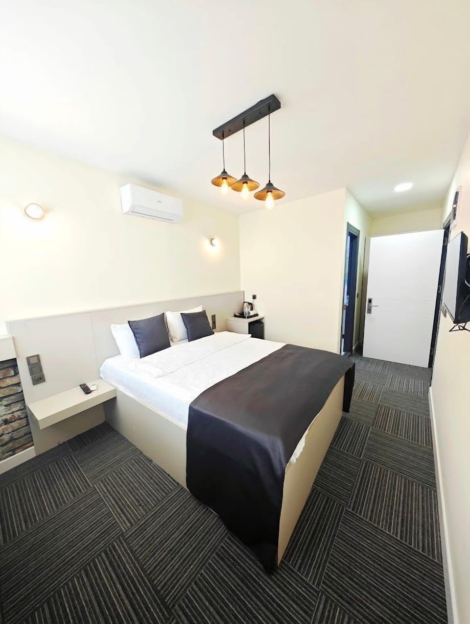 Standard Room | Living area | 30-inch LED TV with premium channels, TV, computer monitors