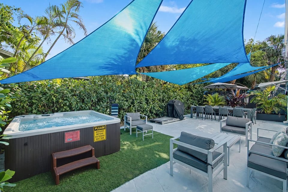 Private hot tub oasis—perfect to unwind after the beach.