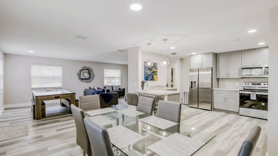 Spacious open layout—plush seating, dining for six, perfect for gatherings
