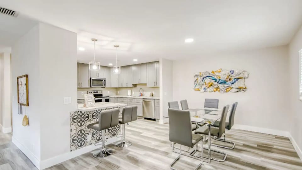Open kitchen and dining area perfect for meals and conversation.