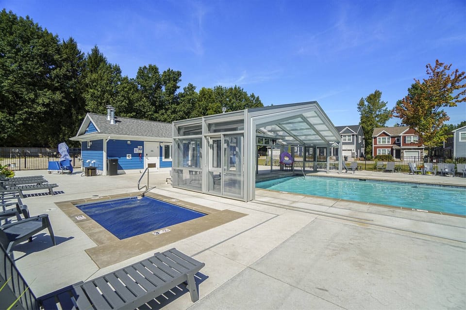 Enjoy the Harbor Clubs beautiful indoor/outdoor pool and relaxing hot tub, complete with plenty of loungers and sunny open space.