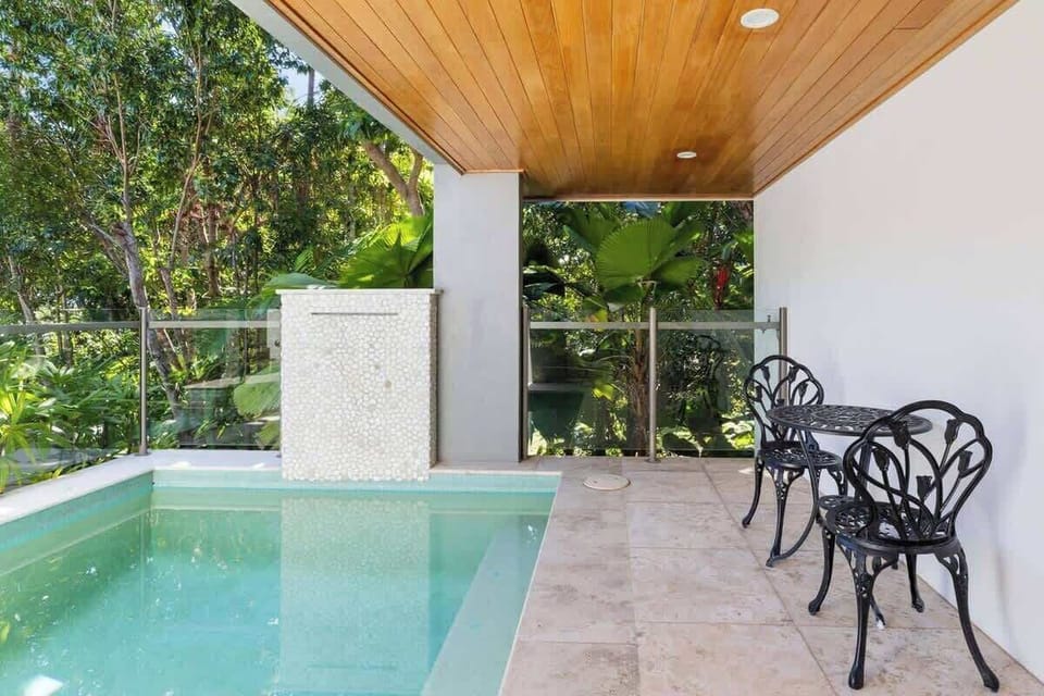 A plunge pool invites you to enjoy a refreshing dip to escape the Far North Queensland heat.