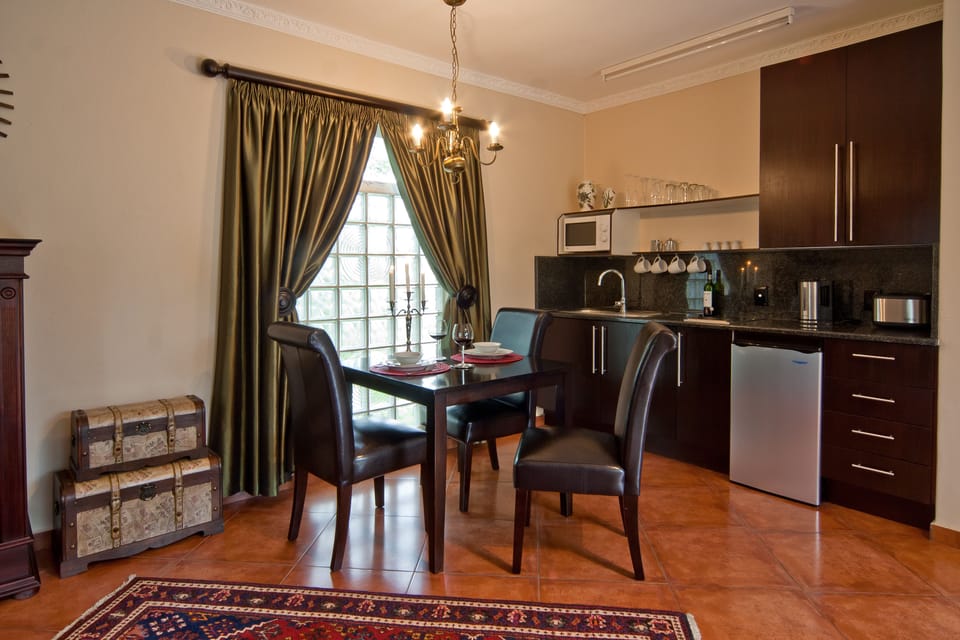 Executive Suite | Private kitchenette | Mini-fridge, coffee/tea maker, electric kettle