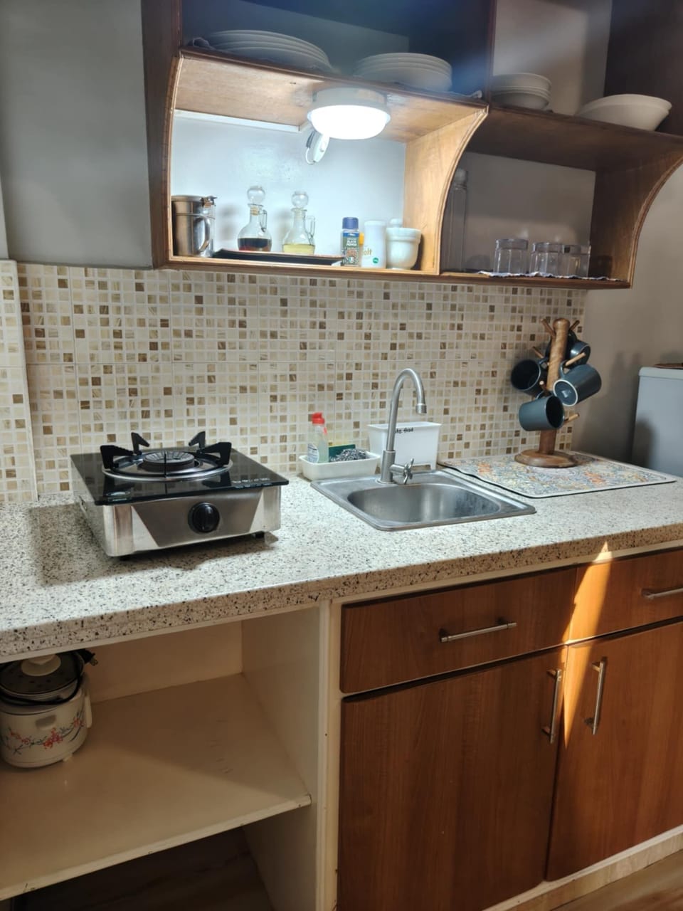 kitchenette with all the essentials to make that special meal .