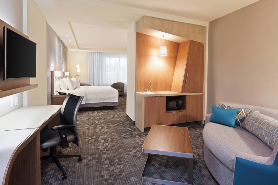 Suite, 1 Bedroom | Desk, iron/ironing board, free WiFi, bed sheets