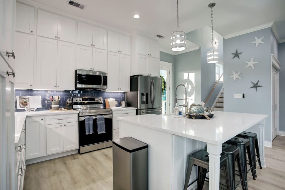 Kitchen with oversized island perfect for entertaining