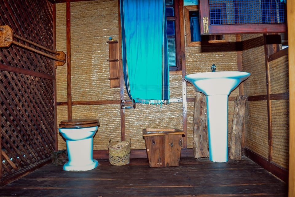 Shower, rainfall showerhead, bathrobes, towels