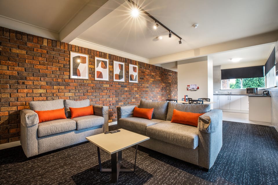 Two Bedroom Aparment | Living area | 40-inch TV with digital channels