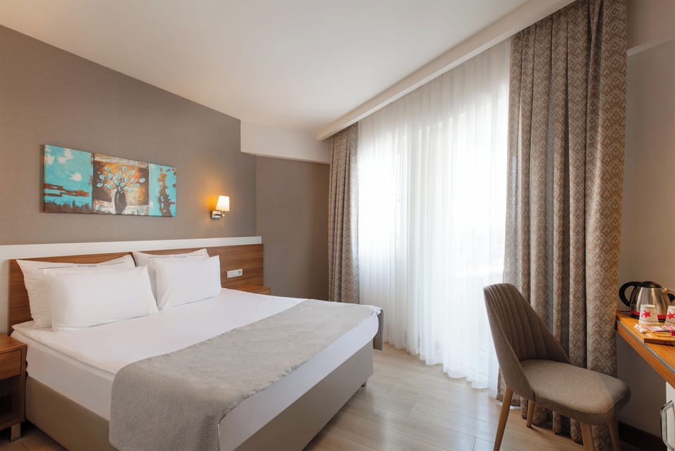 Family Deluxe Room | Minibar, in-room safe, free cribs/infant beds, free WiFi
