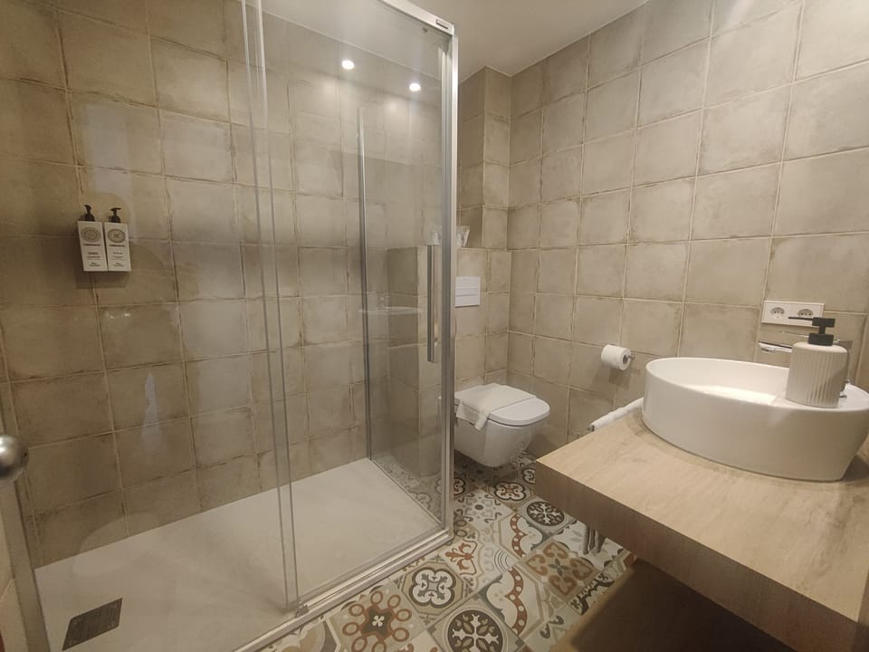 Double Room, Balcony, Sea View | Bathroom | Free toiletries, hair dryer, towels