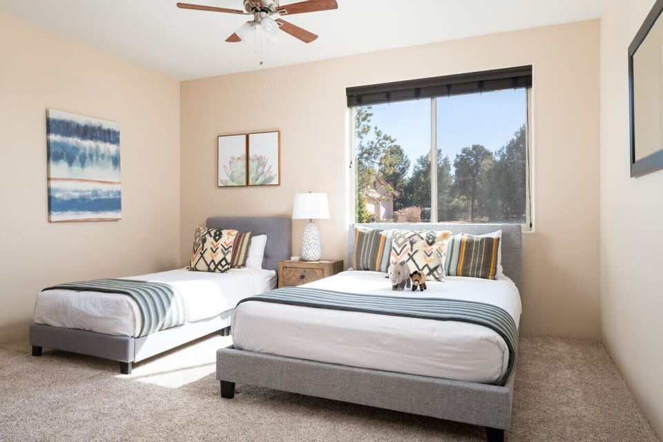 The Javelina Room features a queen-sized bed and an XL single bed