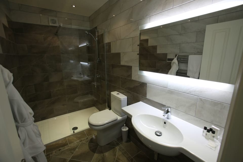 Shower, free toiletries, hair dryer, bathrobes