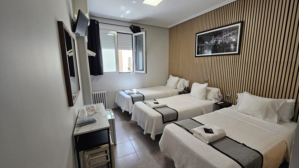 Family Room (3 people) | Desk, blackout drapes, iron/ironing board, free WiFi