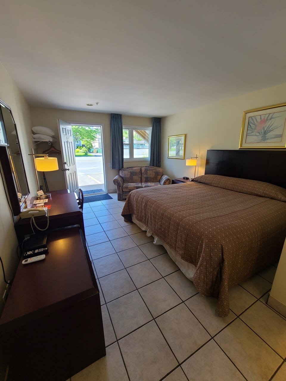 Room, 1 Queen Bed, Refrigerator & Microwave, Lake View | Desk, laptop workspace, blackout drapes, free WiFi