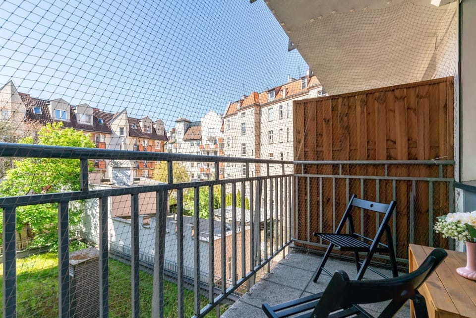 The balcony provides a perfect spot for evening relaxation. 