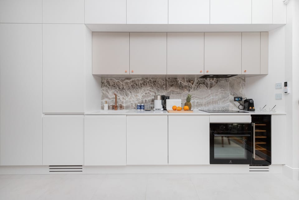 The kitchenette's practical layout maximizes space and functionality.