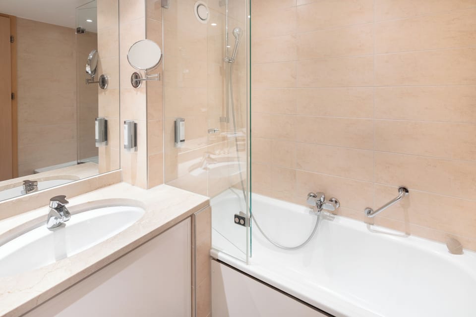 Suite, 1 Bedroom | Bathroom | Eco-friendly toiletries, hair dryer, towels