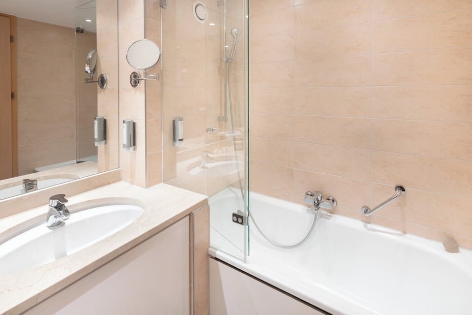 Suite, 1 Bedroom | Bathroom | Eco-friendly toiletries, hair dryer, towels
