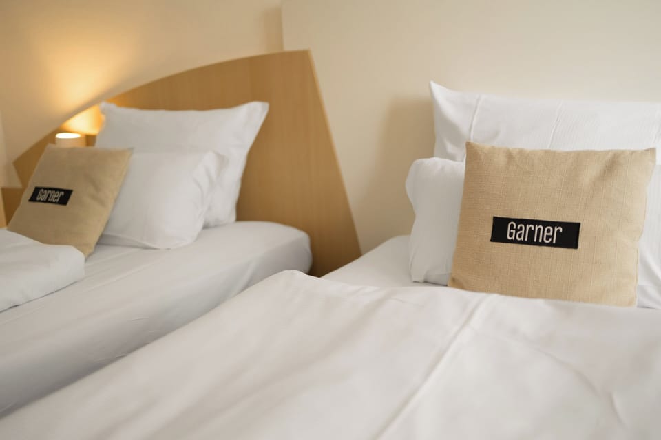 Standard Room, 2 Twin Beds | In-room safe, desk, laptop workspace, blackout drapes