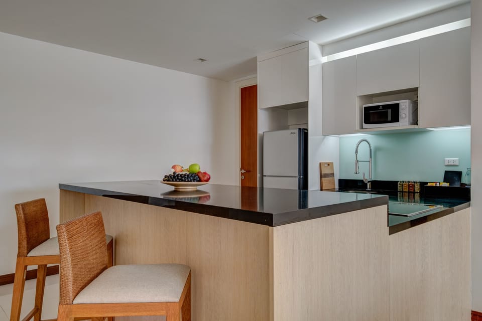 Fridge, microwave, toaster, cookware/dishes/utensils
