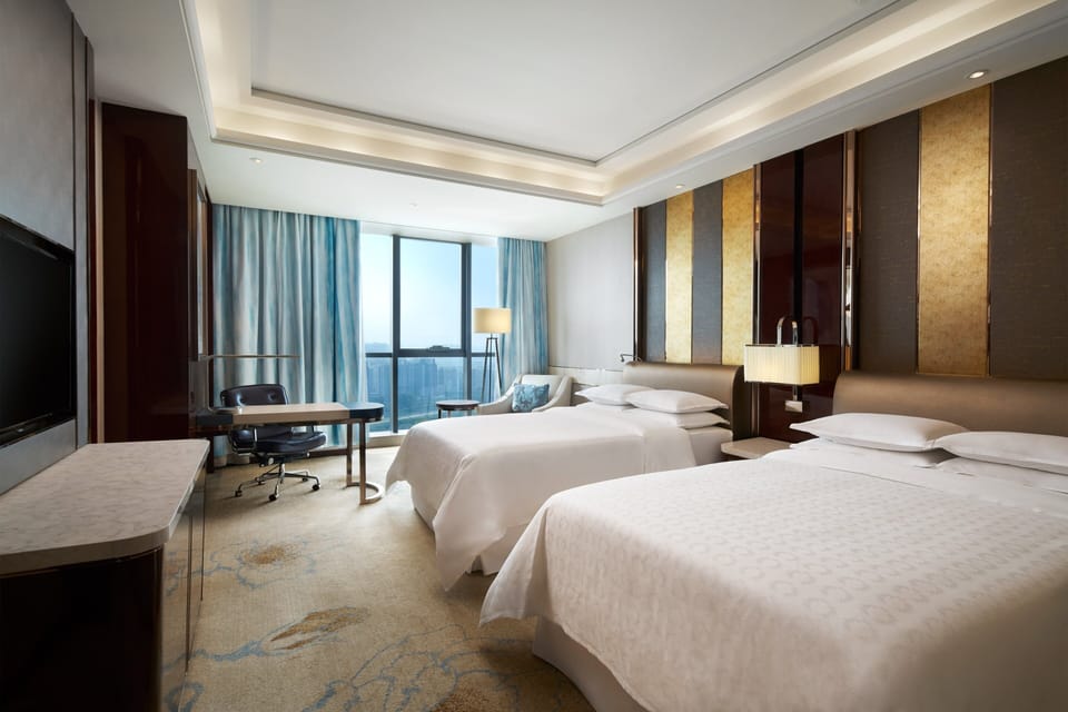 Premium bedding, down comforters, minibar, in-room safe