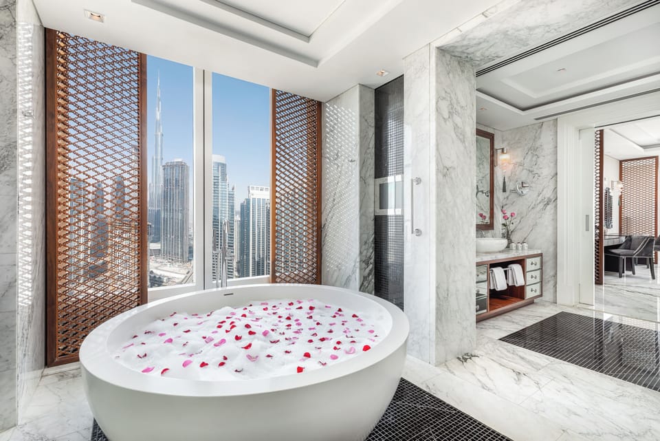 Separate tub and shower, deep soaking tub, designer toiletries